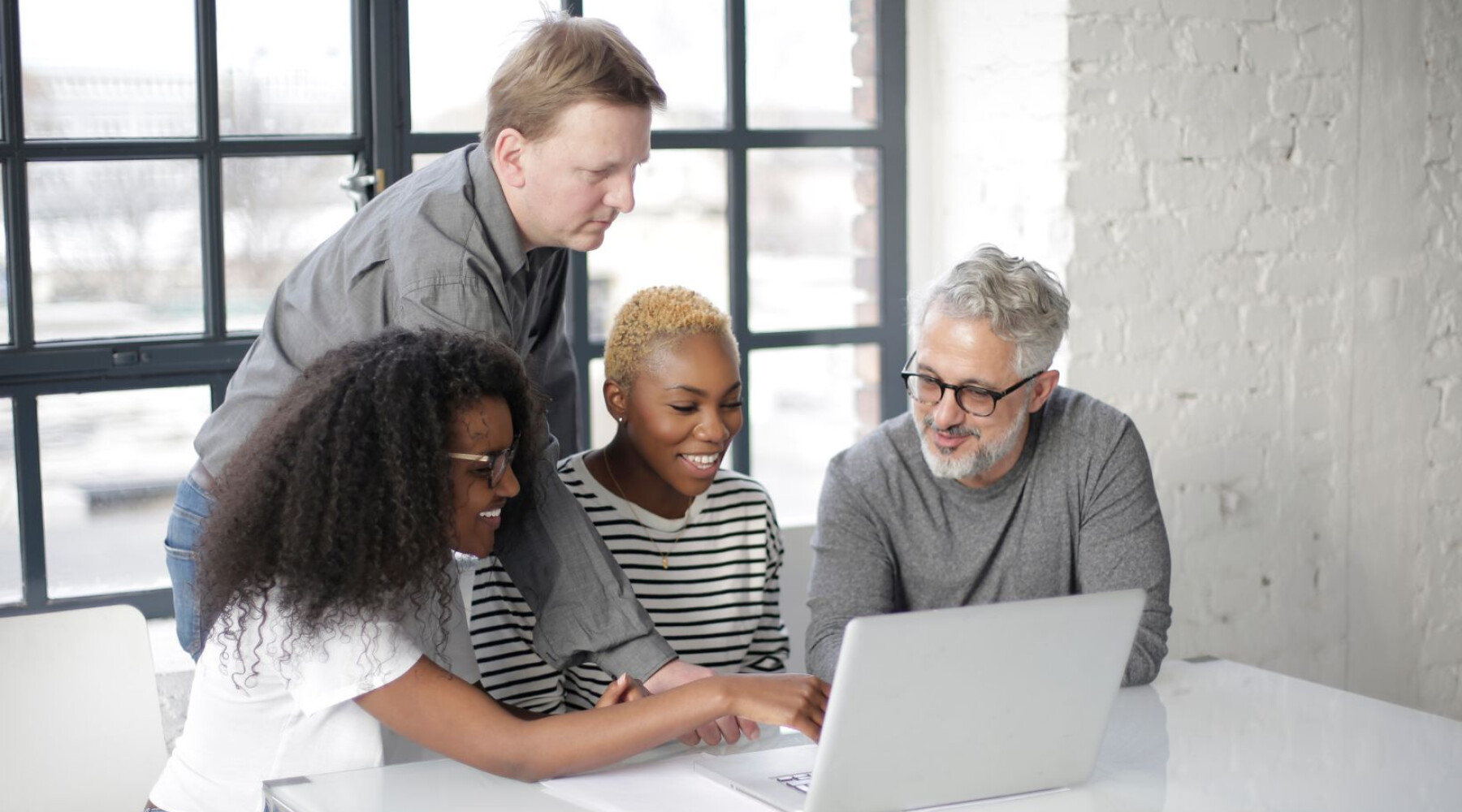 people-beside-laptop