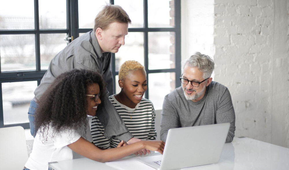 people-beside-laptop